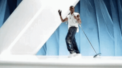 Man Dancing On Stage With Mop GIF