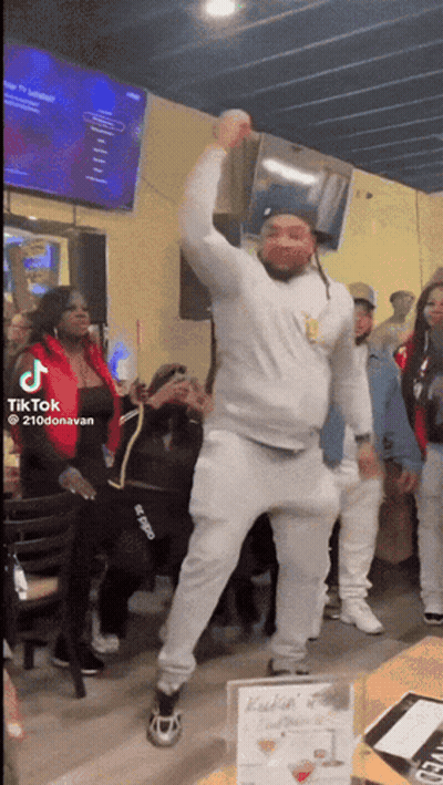 Man Dancing With Bag Over Head GIF