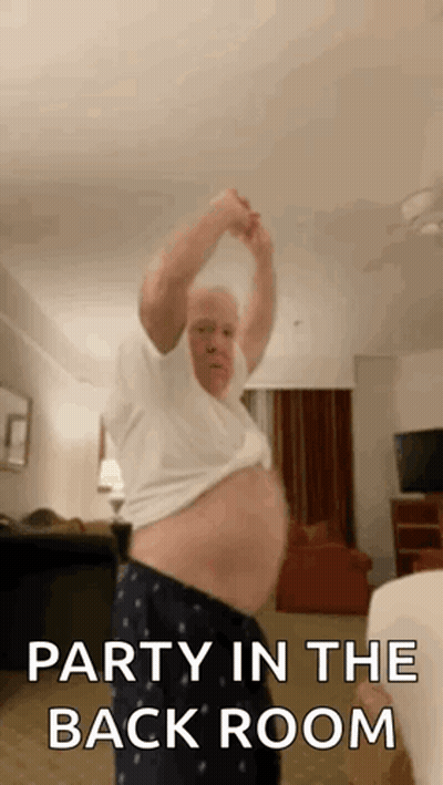 Man Dancing With Party In The Back Room GIF