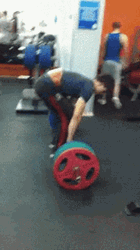 Man Deadlift And Straightening Back GIF