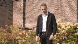 Man Deploying The Drone GIF