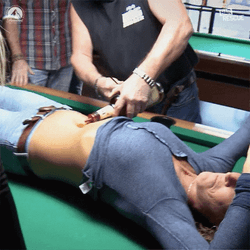 Man Diving On Belly Button Shots GIF