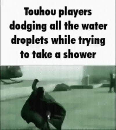 Man Dodging Water Droplets While Showering GIF