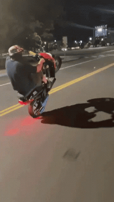 Man Doing Motorcycle Trick GIF