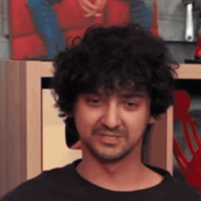 Man Doing Pull Ups Holding Pipe In Mouth GIF