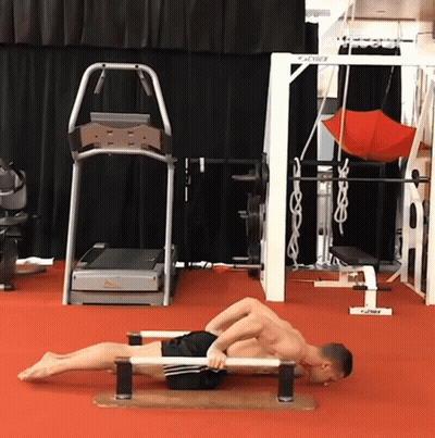 Man Doing Push Ups With Ocybex Machine GIF