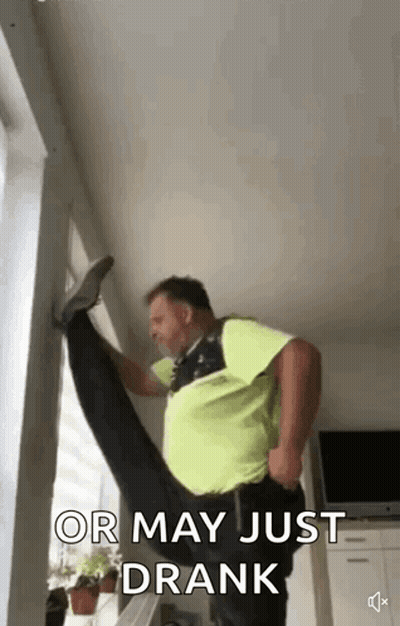 Man Doing Split Next To Window GIF