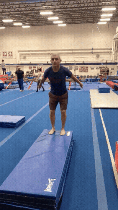 Man Doing Trick On Modern Mat GIF