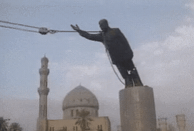 Man Doing Trick On Pole In Front Of Mosque GIF