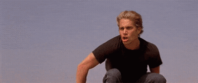 Man Doing Trick On Truck Next To Orange Car GIF