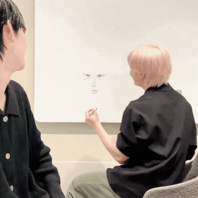 Man Drawing Face On Whiteboard GIF