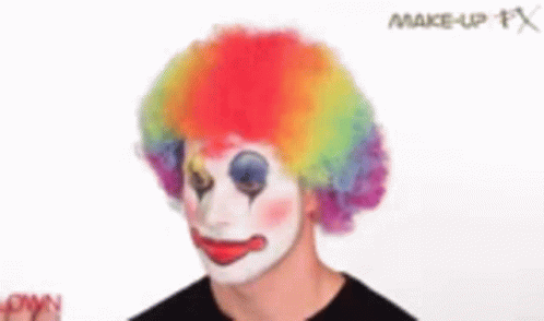 Man Dressed As Clown With Rainbow Wig GIF