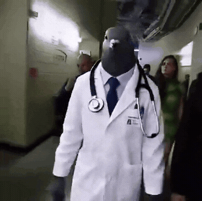 Man Dressed As Doctor With Pigeon Head GIF