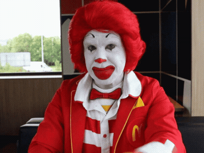 Man Dressed As Ronald McDonald With Red Hair GIF