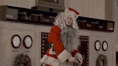 Man Dressed As Santa Claus In Front Of Philadelphia Clock GIF