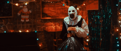 Man Dressed As Santa Claus With Skull Face GIF