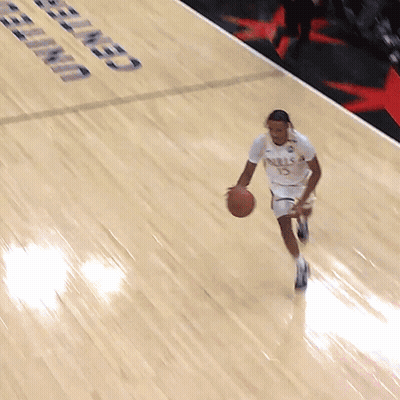 Man Dribbling Basketball At United Center GIF