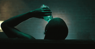 Man Drinking From Bottle In Bathtub GIF