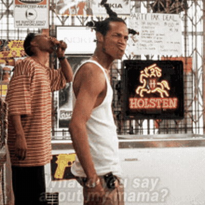 Man Drinking From Bottle In Front Of Holsten Sign GIF