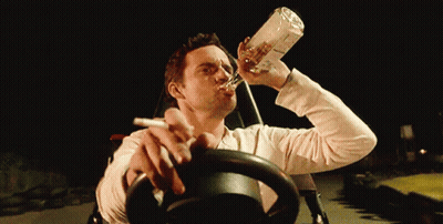 Man Drinking From Bottle Smoking Cigarette GIF