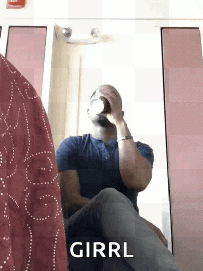 Man Drinking From Bottle With Girrl GIF