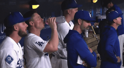 Man Drinking From Bottle With Letter A GIF