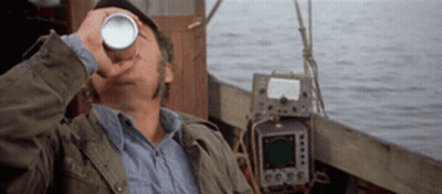 Man Drinking From Can On Boat GIF