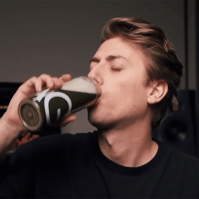 Man Drinking From Can With G GIF