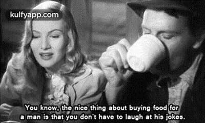 Man Drinking From Cup While Woman Looks On GIF