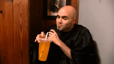 Man Drinking From Cup With Straw GIF