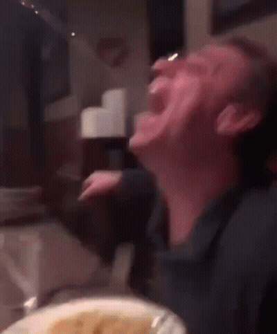 Man Drinking From Glass At Table With Food GIF