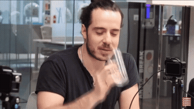 Man Drinking From Glass Before Art Of Break Sign GIF