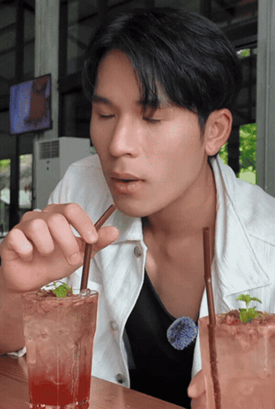 Man Drinking From Glass With Straw GIF