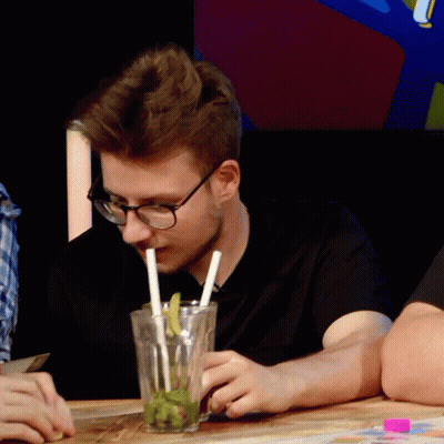 Man Drinking From Glass With Two Straws GIF