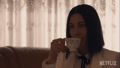 Man Drinking From Square Pattern Mug GIF