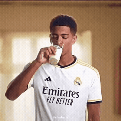 Man Drinking Milk In Emirates Fly Better Jersey GIF