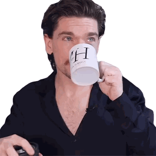 Man Drinking Mug With H Sticker