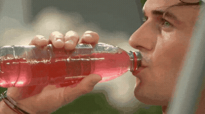 Man Drinking Red Liquid GIF