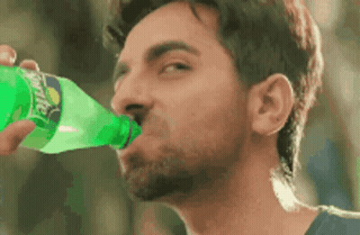 Man Drinking Sprite From Bottle GIF