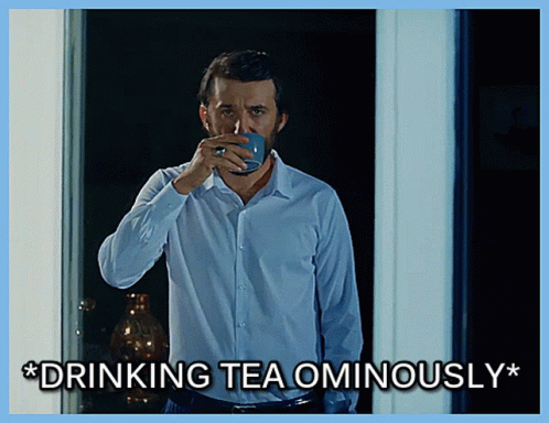 Man Drinking Tea Ominously GIF