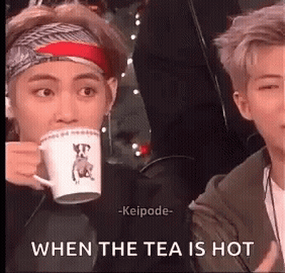 Man Drinking Tea While Another Watches GIF