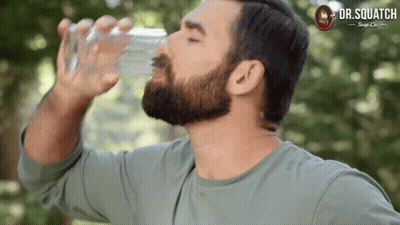 Man Drinking Water From Glass Dr. Squatch GIF