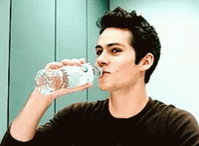 Man Drinking Water From Plastic Bottle GIF