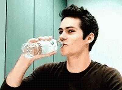 Man Drinking Water From Plastic Bottle GIF
