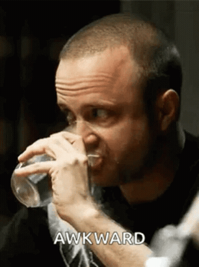 Man Drinking Water Making Face GIF