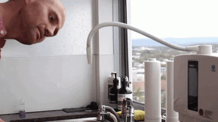 Man Drinking Water Spout GIF