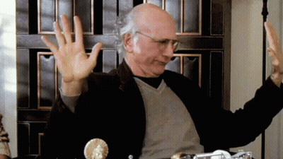 Man Drinking While Woman And Children Do Homework GIF