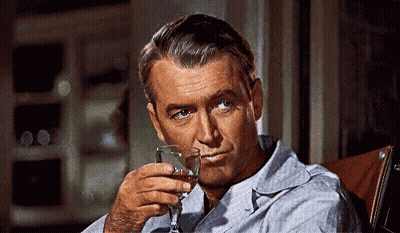 Man Drinking Whiskey and Smoking
