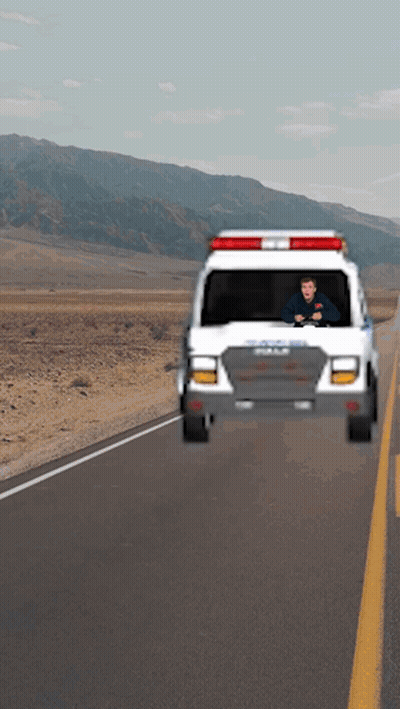 Man Driving Ambulance On Desert Road GIF