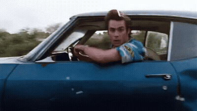 Man Driving Blue Car GIF